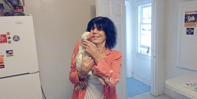 Miss Earth Angel being held by Karen