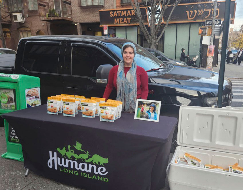 Humane Long Island vegan chick'n giveaway in Williamsburg, Brooklyn in Karen's honor outside of Satmar Meats 