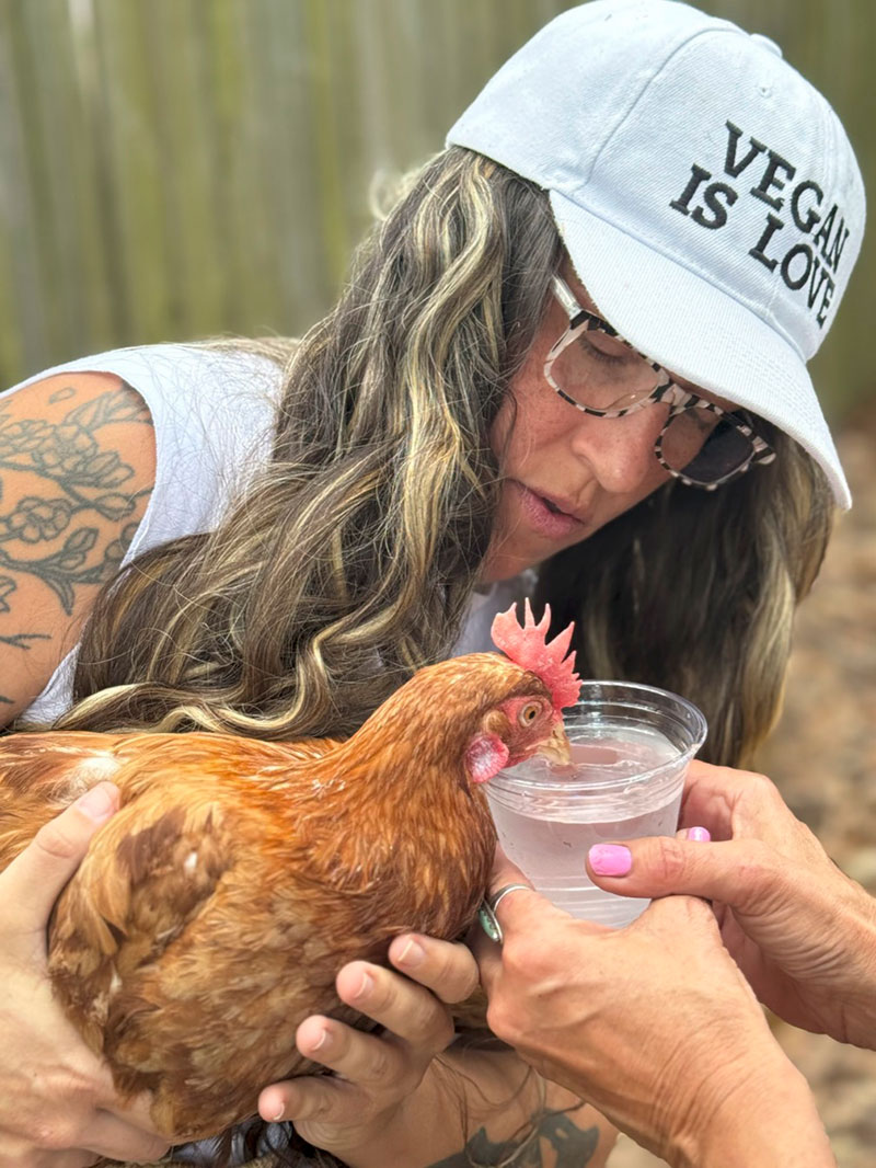 Shannon Blair gives Karen some water.
